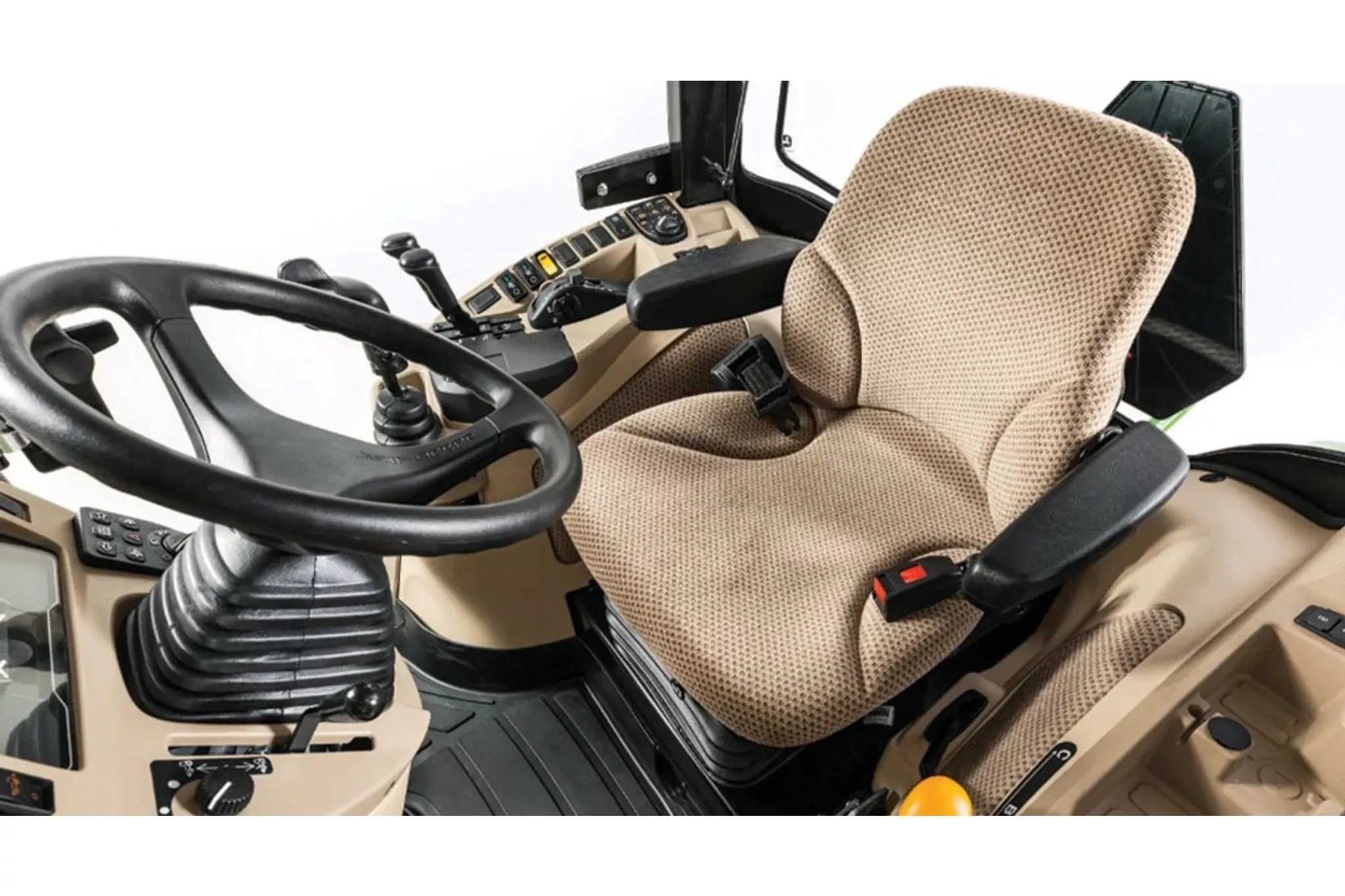 Studio image of the inside of a cab with a focus on the chair and steering wheel