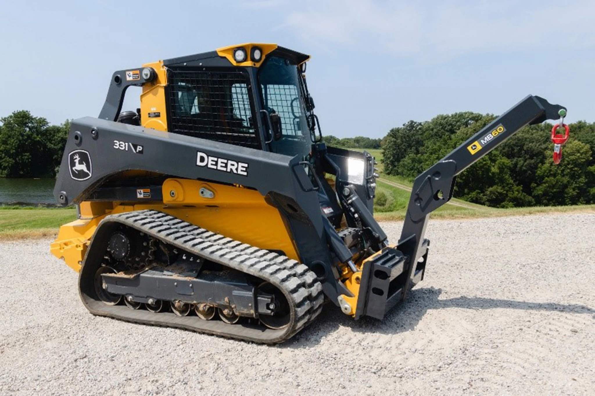 front right field shot of mb60 material boom on a skid steer