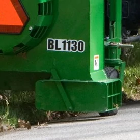 Zoom-in of a BL1130 debris blower's green adjustable discharge outlet
