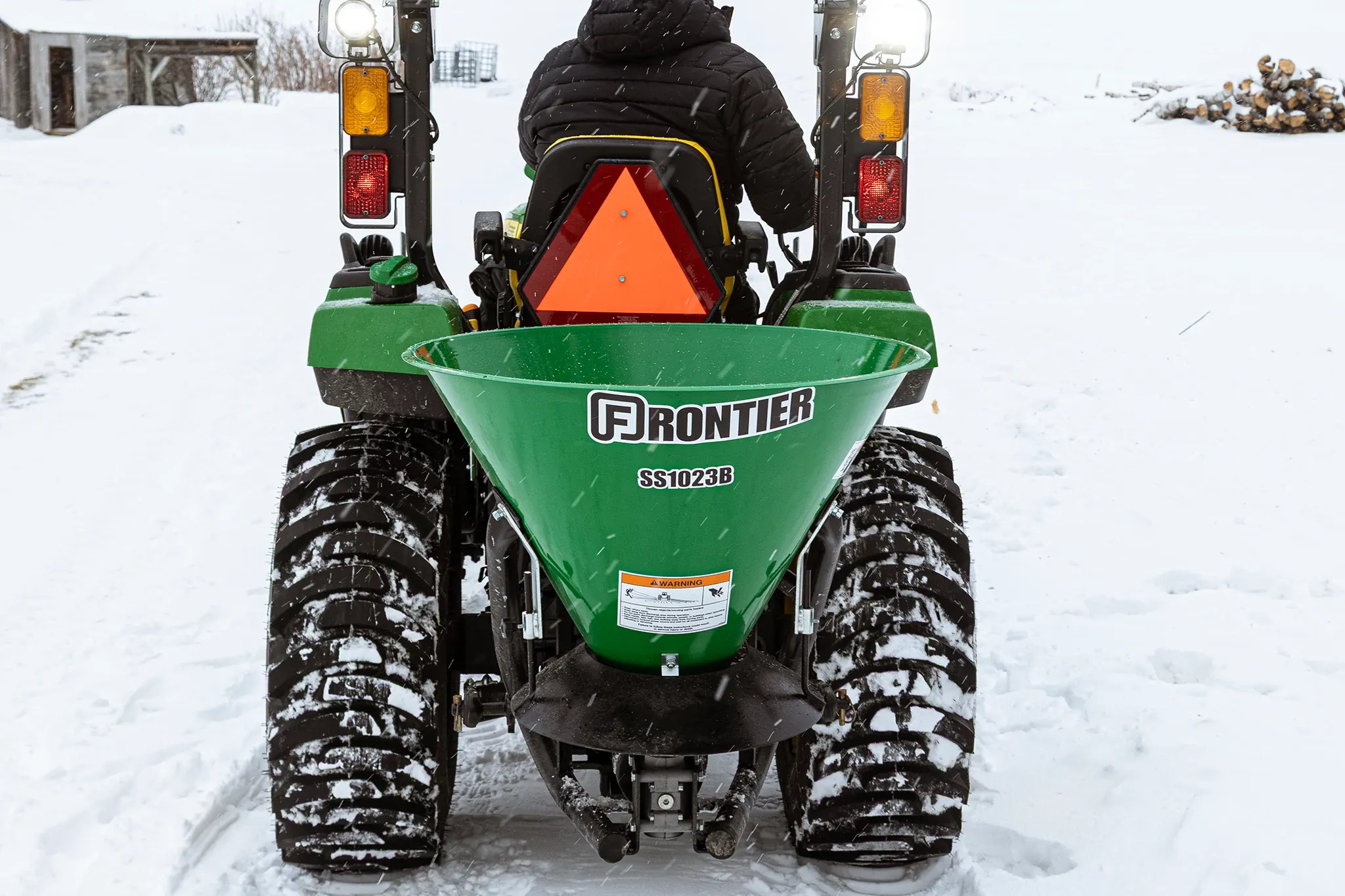 SS1023B on utility tractor in snowy drive
