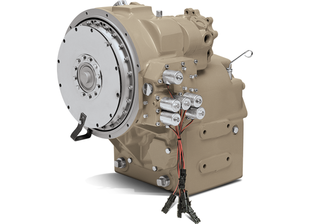 Beige industrial mechanical assembly with a large circular metal plate on one side, mounted on a rectangular housing, featuring small valves and fittings on the front with a bundle of thin wires and connectors hanging from the lower section