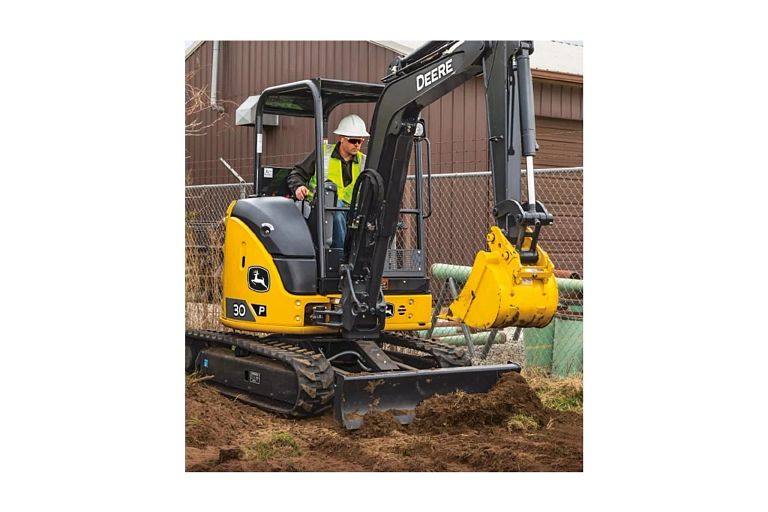 farmer operating a 30 P-Tier in a yard