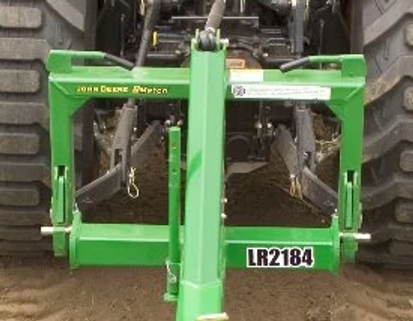 Front view of the LR2184 landscape rake's frame and hitch connection to a tractor