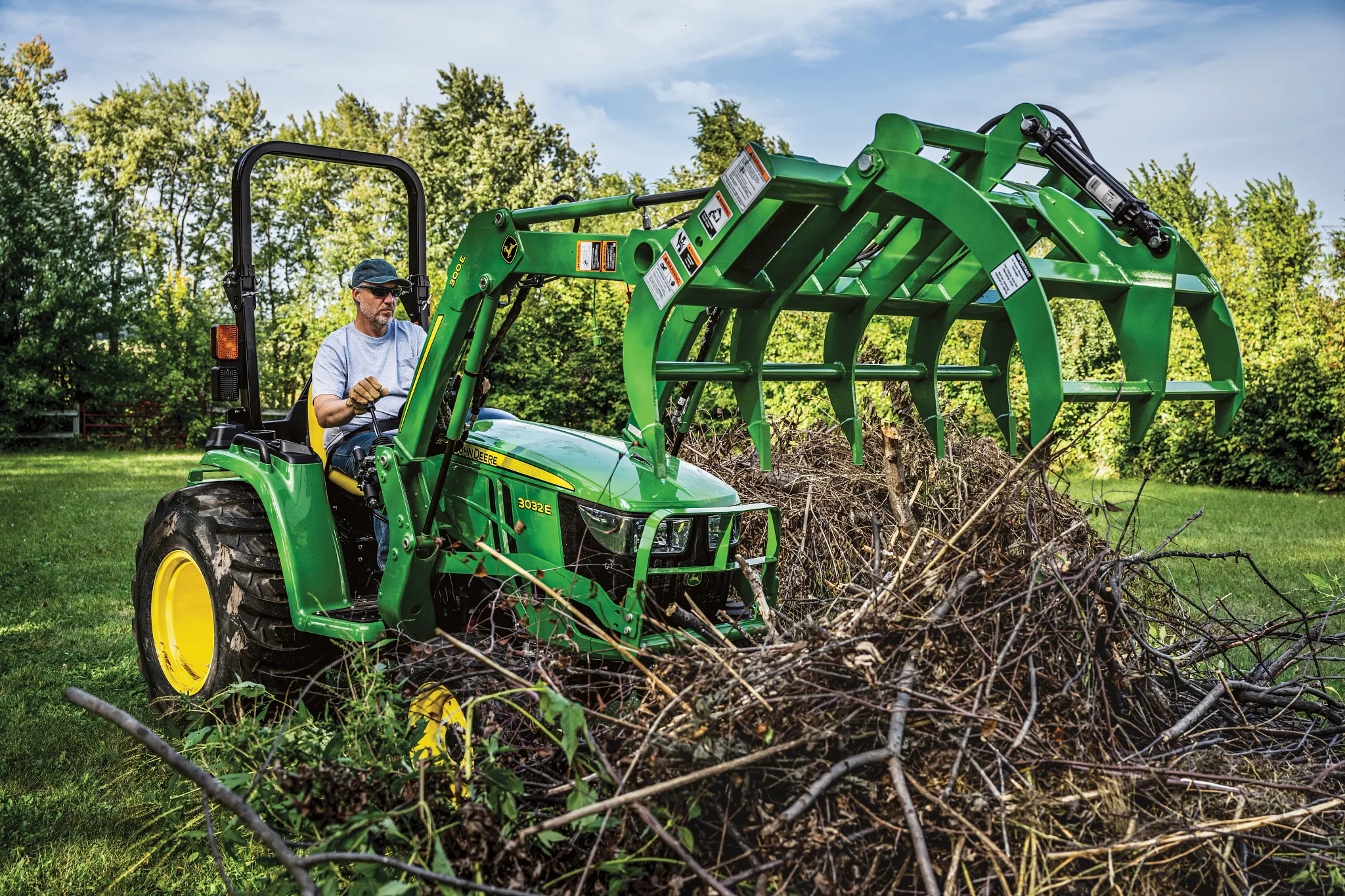 Utility Tractor with Root Grapple with Brush
