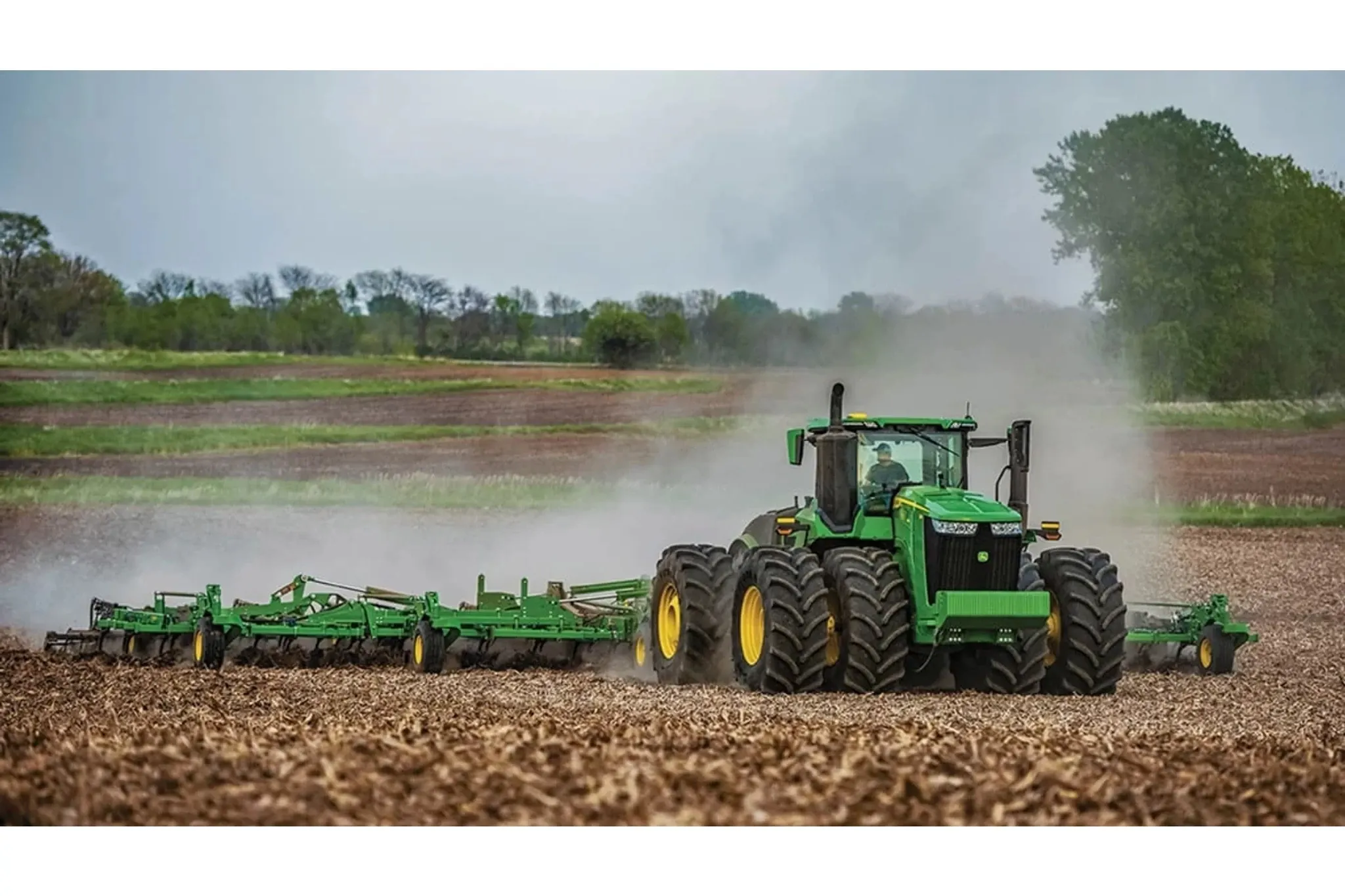 9R 390 Tractor with a tillage attachment in a harvested corn field
