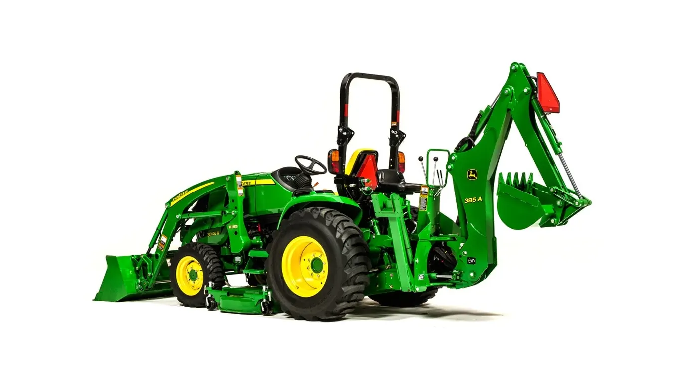 Studio view of a 385A Backhoe mounted on the back of a 3046R Compact Utility Tractor