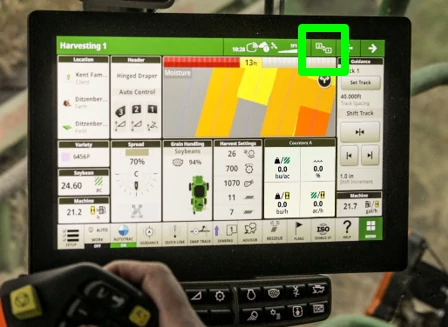 Front view of a G5ᴾˡᵘˢ monitor in the cab of a machine with Extended Monitor Swap Button highlighted