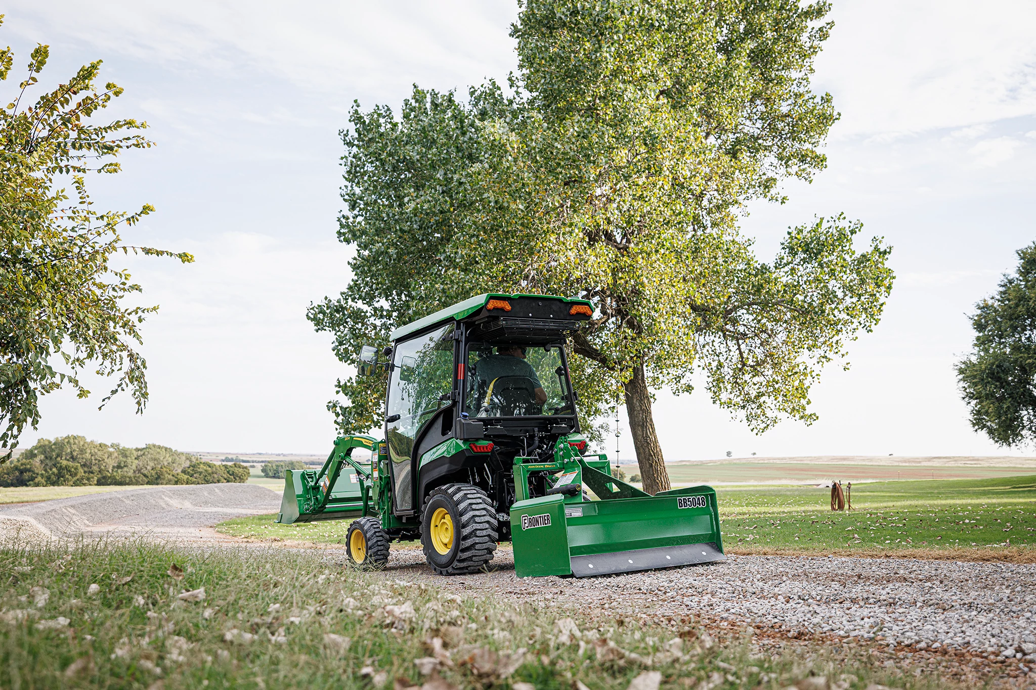 BB5048 Box Blade on Utility tractor on gravel road