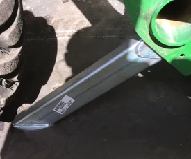 Close-up of a loader's installed parking stand