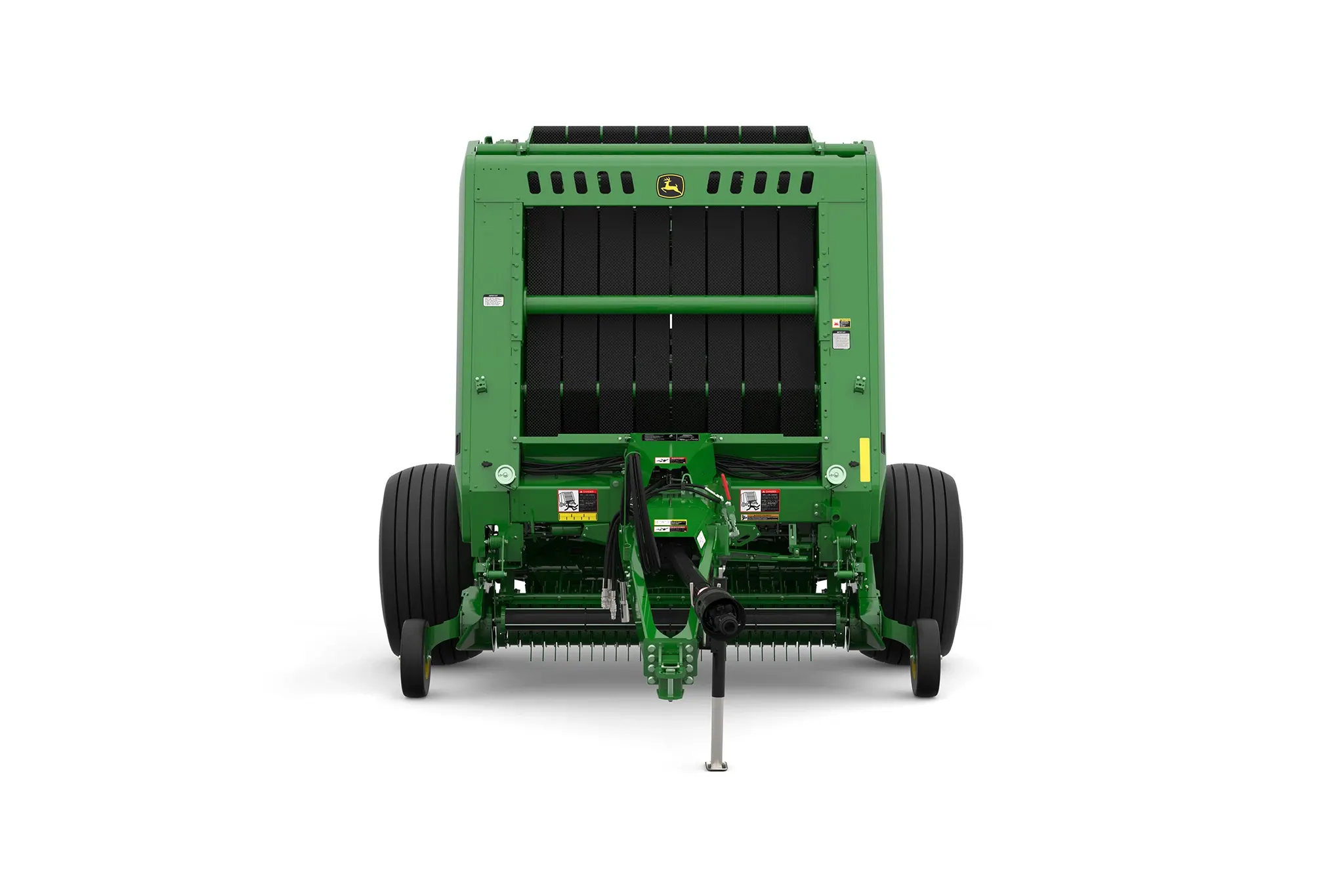 Studio rendering of 561M round baler shown from the front on a white background, featuring a green body, large black tires, open pickup assembly, visible bale chamber belts, PTO driveline, and front tow hitch