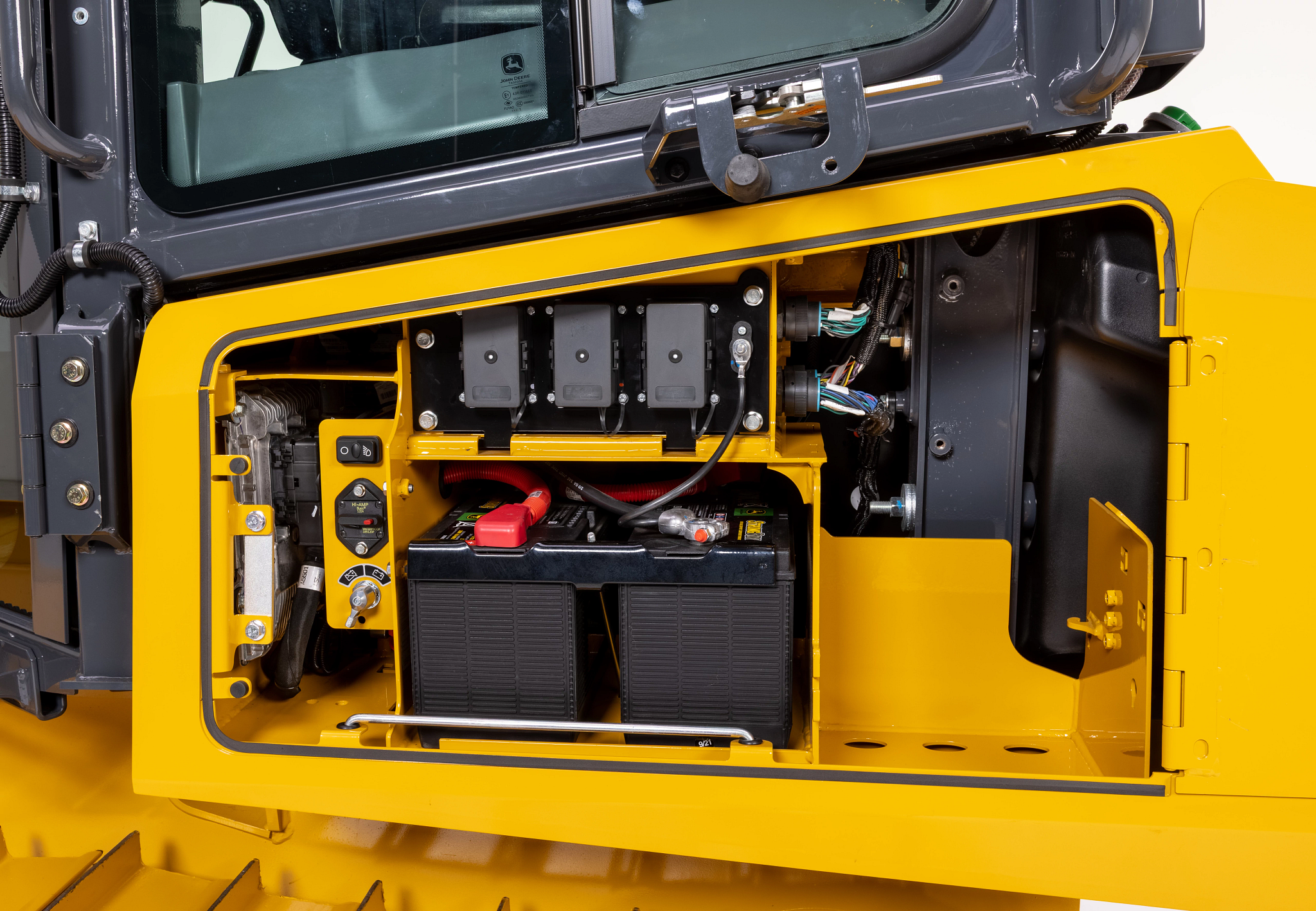 Front view of a 450 P-Tier Dozer's open left service compartment