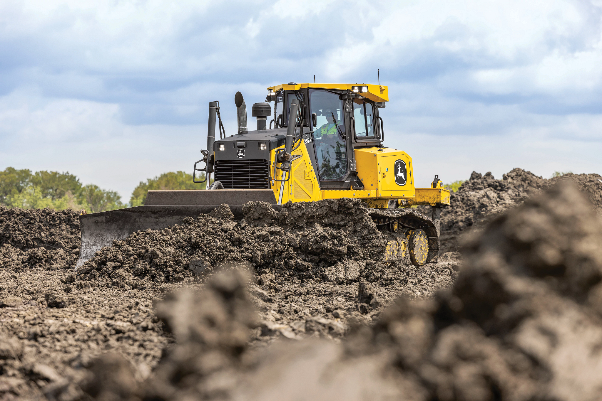 View of an 850 P-Tier construction dozer moving soil