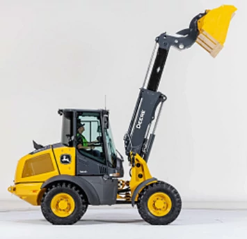 Side-right, studio view of a 326 P-Tier Tele Lift Compact Wheel Loader with boom and bucket fully extended