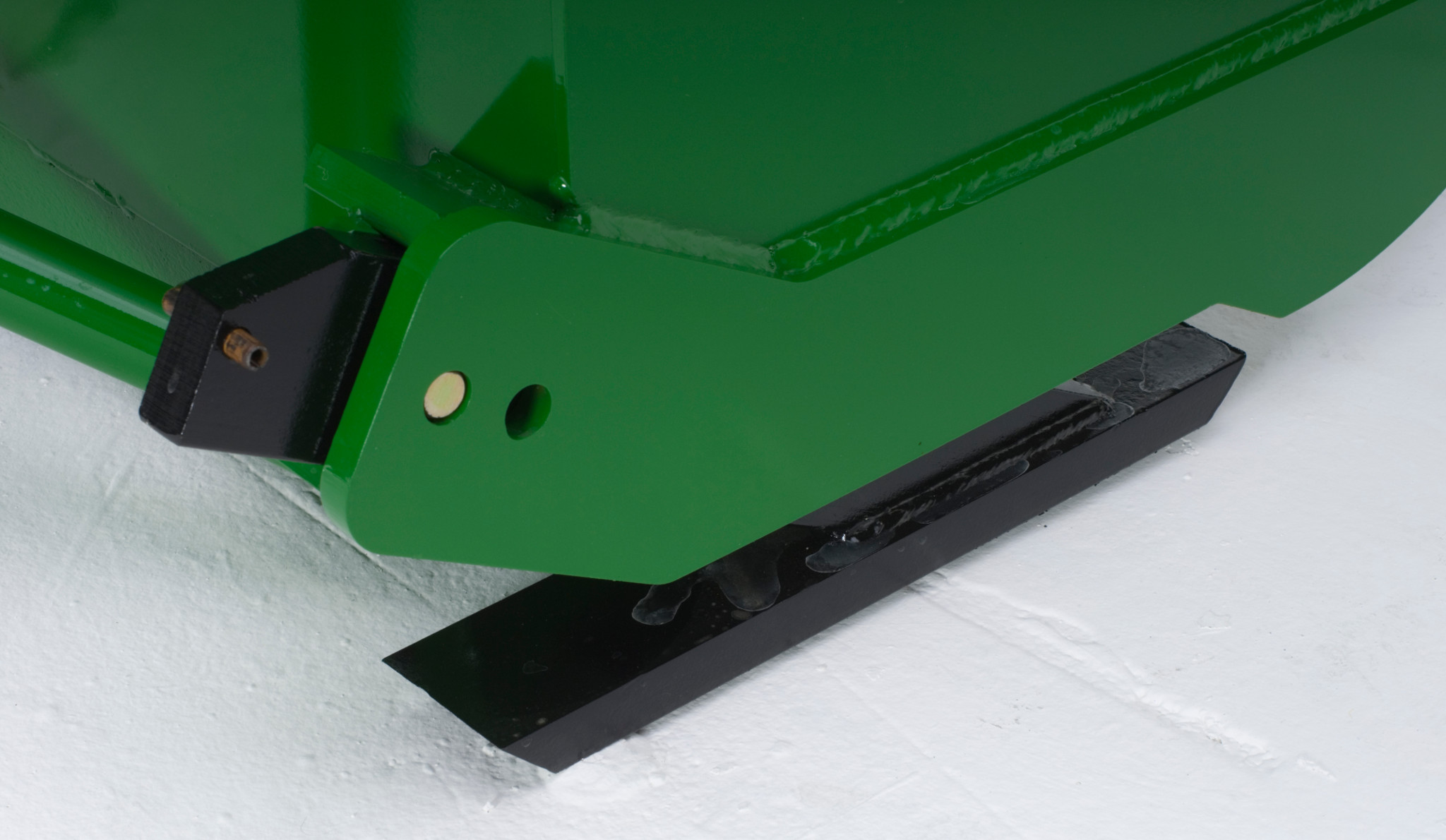 Close-up studio view of skid shoe on the underside of the SB13 Snowblower