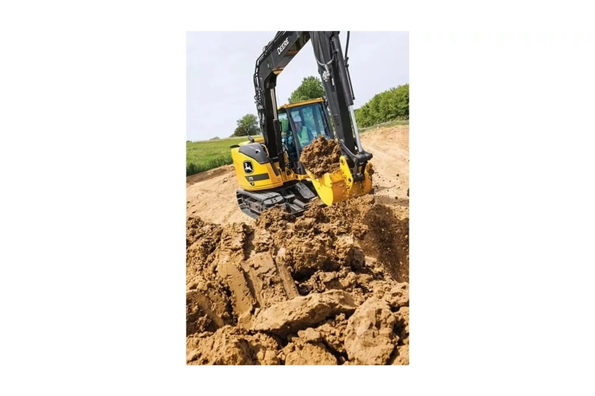 75 P-Tier Compact Excavator moving dirt