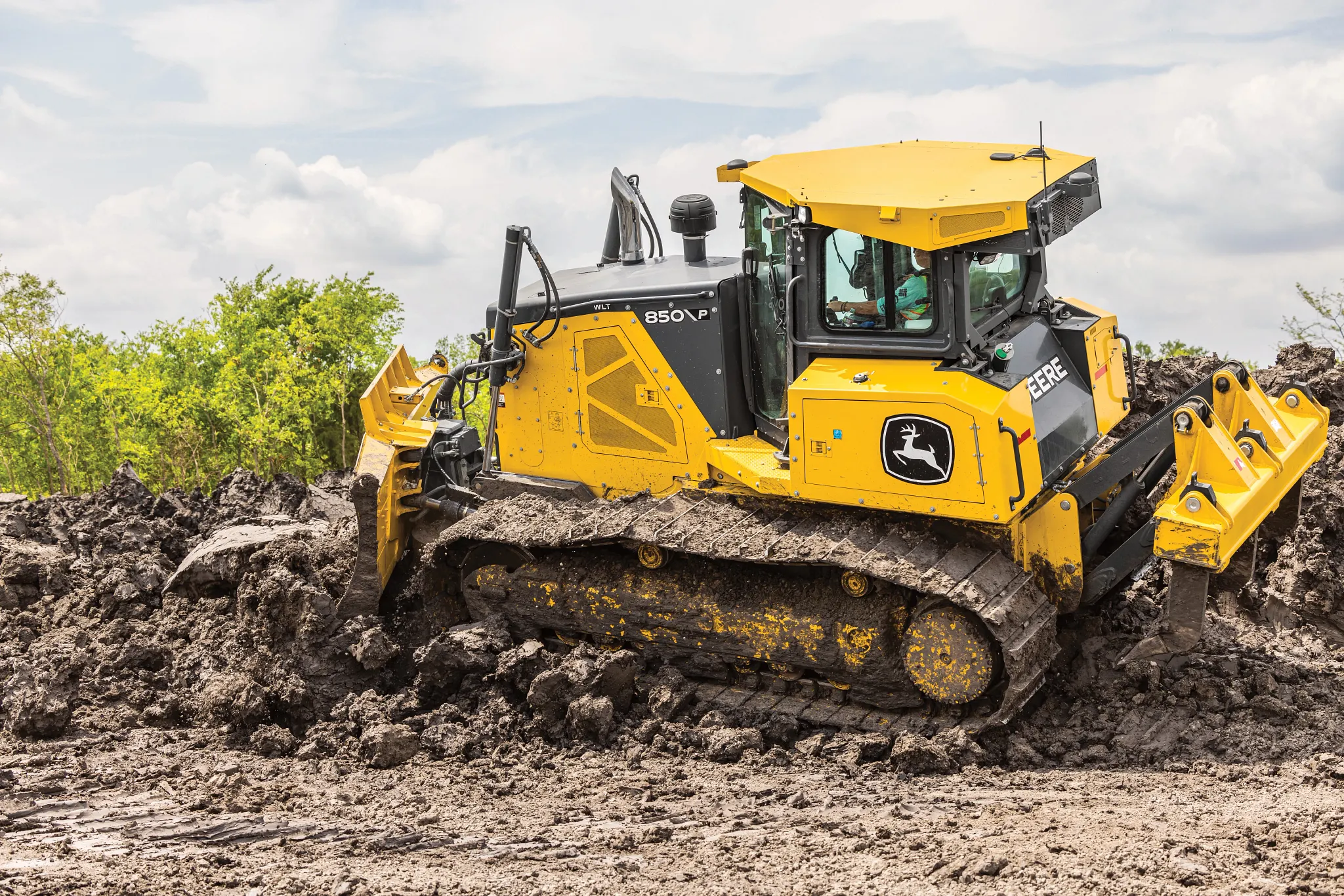 View of an 850 P-Tier construction dozer moving soil