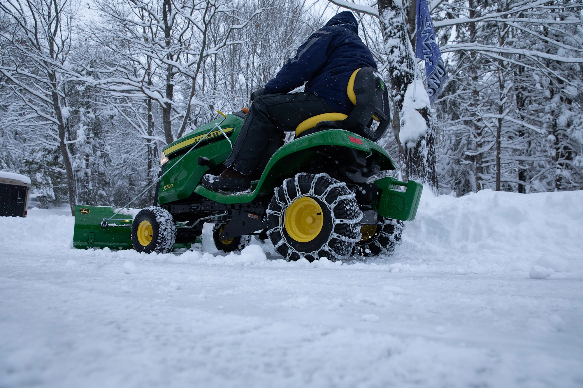 The 112-cm (44-in.) Front Blade can be operated from 2.5 cm (1 in.) below ground level to 12.7 cm (5 in.) above ground level.