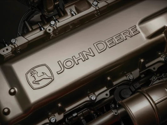 Close-up shot of John Deere logo on an engine