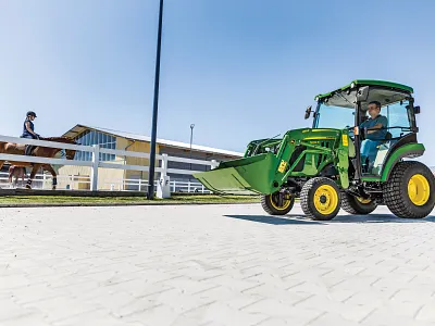 2032R Compact Utility Tractor Wide Action Shot - Left View