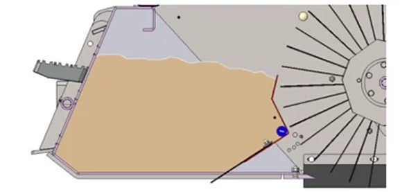 Side‑view schematic showing material moving through a machine housing toward a rotating brush