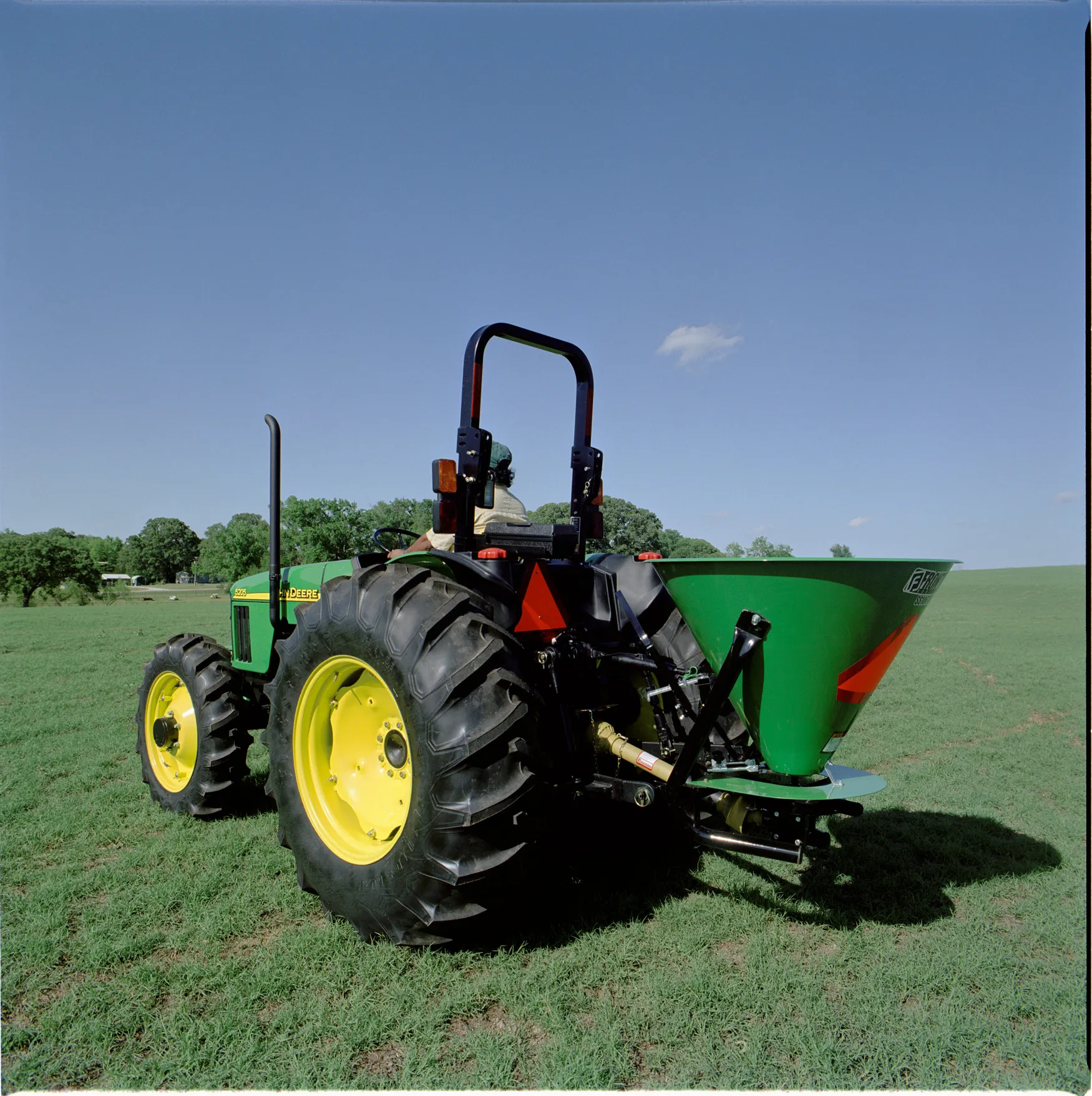 SS1067B on 5 series tractor in field