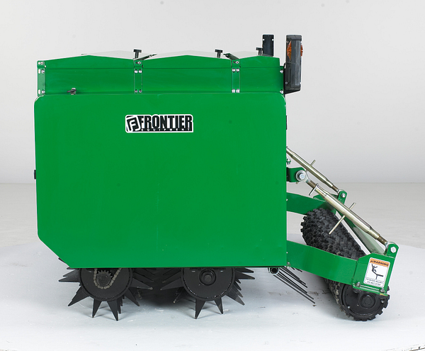 Left side studio view of CS Conservation Seeder showing the seedbox, spiked rollers, and rear cultipacker