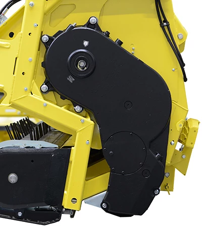 Side studio view of a 46R hay pick up's black and yellow chainless drive system