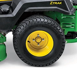 Close-up side studio view of a Z515E ZTrak™ Mower's left rear tire
