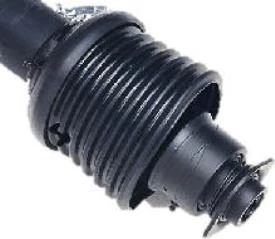Studio close-up of a black rearward-swinging hydraulic cylinder