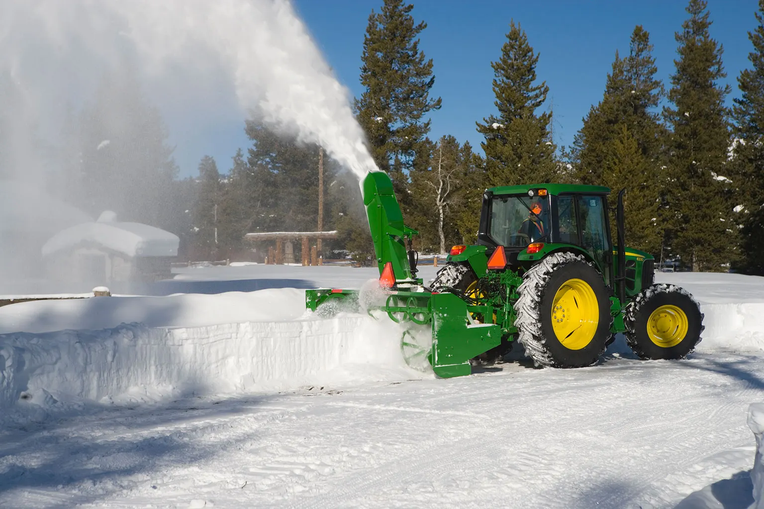 Blowing snow using a SB1309R Snowblower on 6330 Tractor