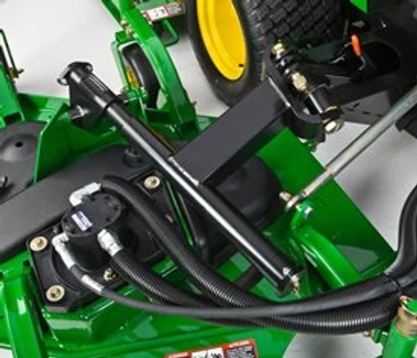 Top close-up of 1600 Turbo TerrainCut mower's deck and patented impact-absorbing system