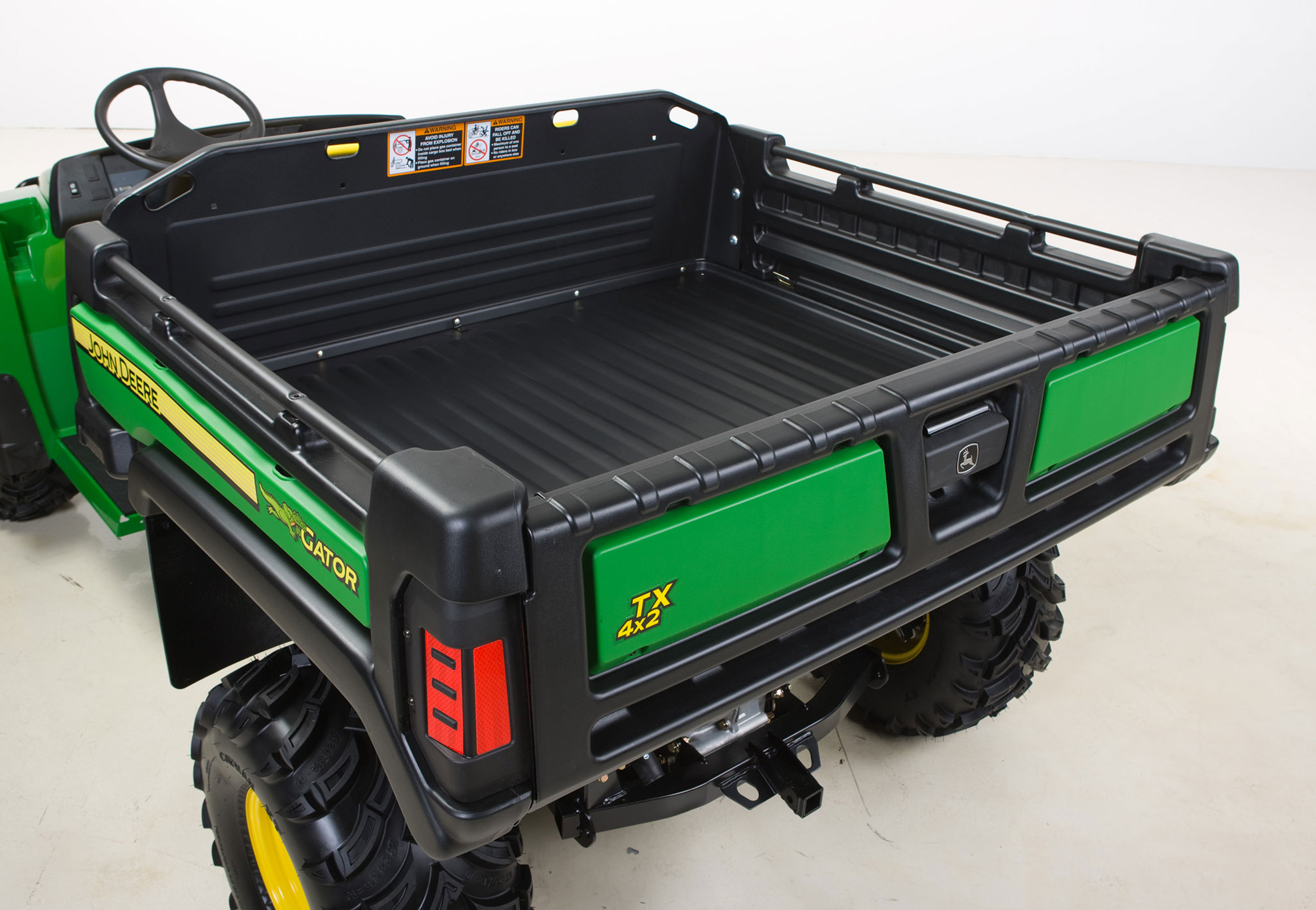 Rear left studio view of polypropylene composite deluxe cargo box on TX 4x2 Utility Vehicle