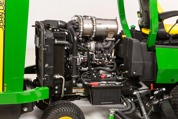 Side studio view of the uncovered diesel engine of a 1600 Turbo Series III wide area mower
