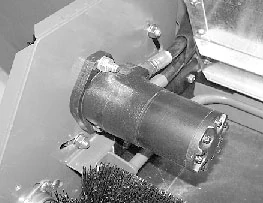 Angled top view of a TD100 Top Dresser's hydraulic drive motor