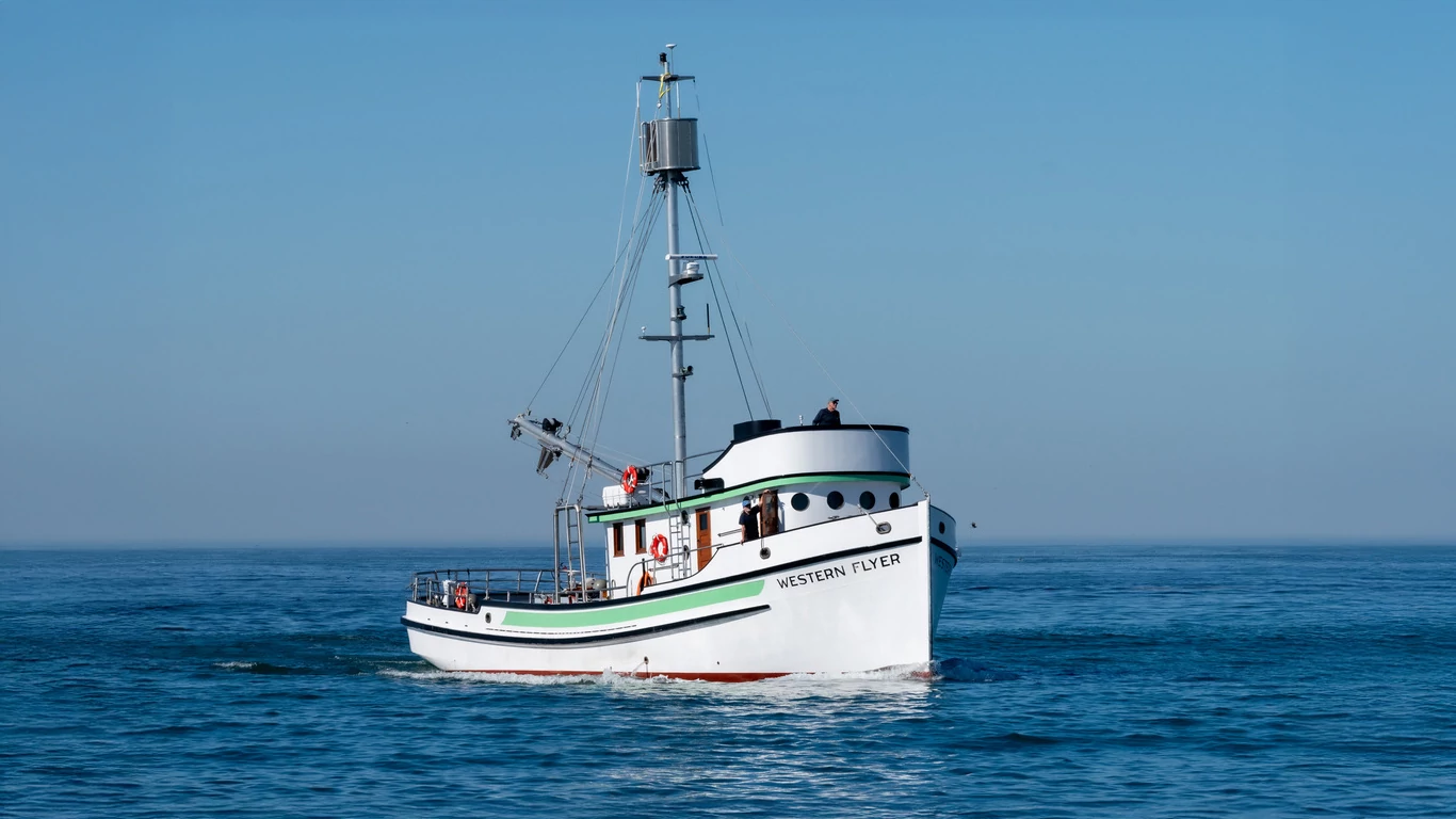 The Western Flyer vessel on the water powered by a John Deere marine engine