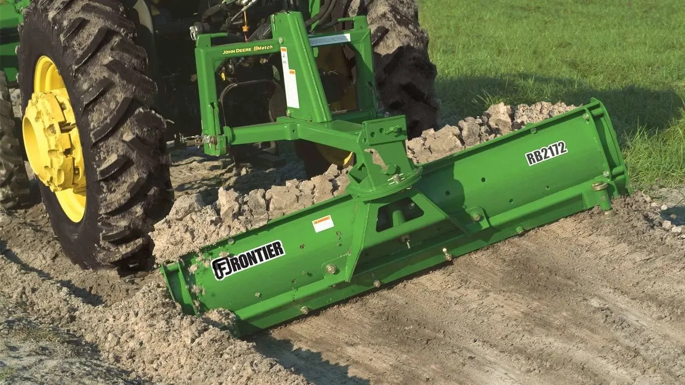RB21 Rear Blade being pulled behind a tractor