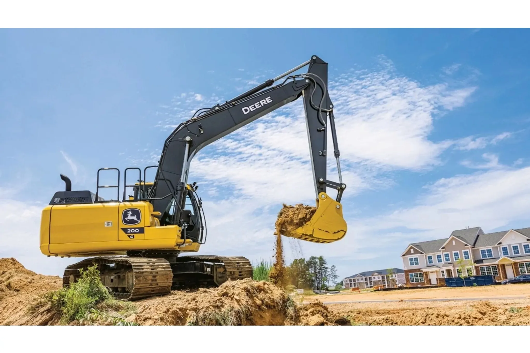 200G compact excavator digging a hole in the ground