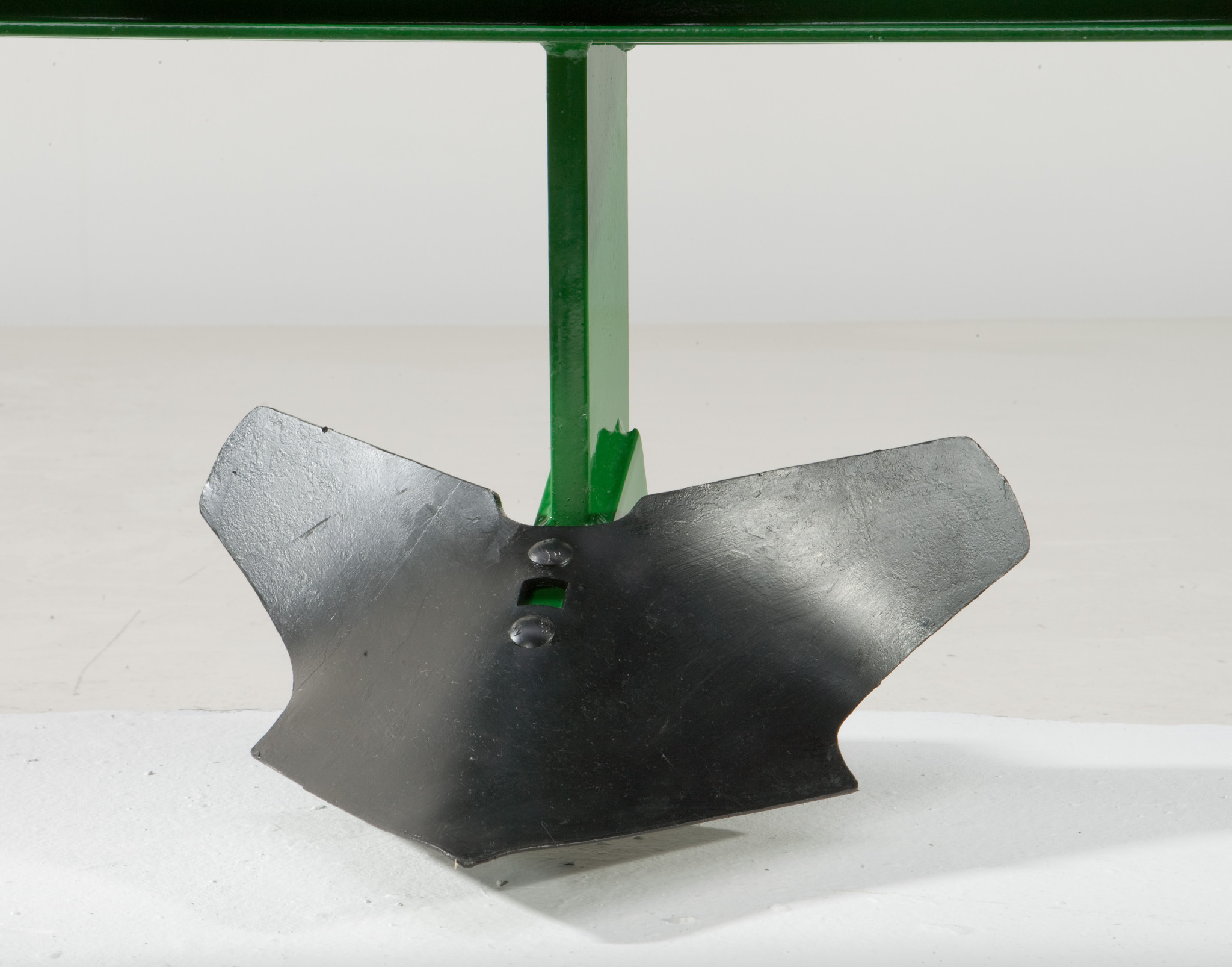 Close-up of double-wing cutting blade of PM10 Middle Buster