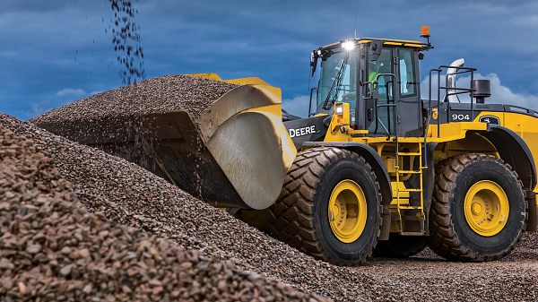 904 wheel loader moving rock on job site.