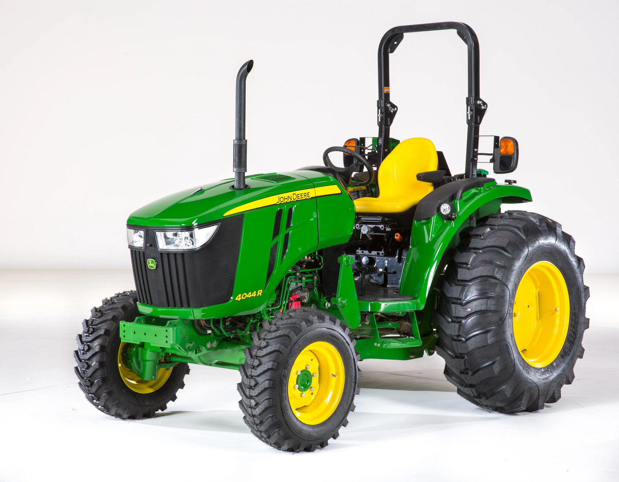 Studio front left shot of a 4044R OOS compact utility tractor